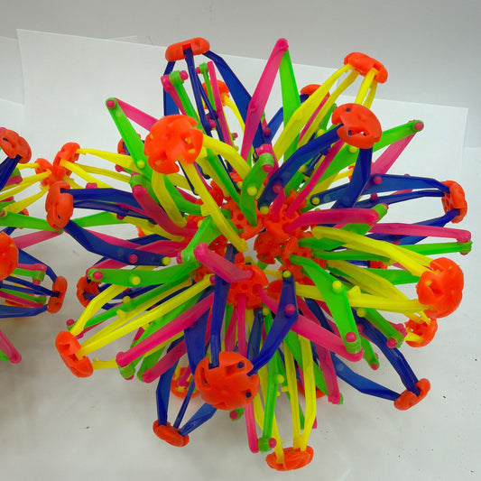 Lot of 2 Expanding Plastic Fidget Sphere Balls Multicolor