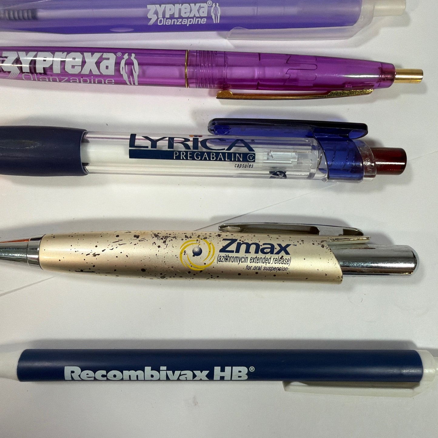 Lot of 7 Pharmaceutical Promo Click Pens Aricept Zyprexa Lyrica Havrix Zmax Rec