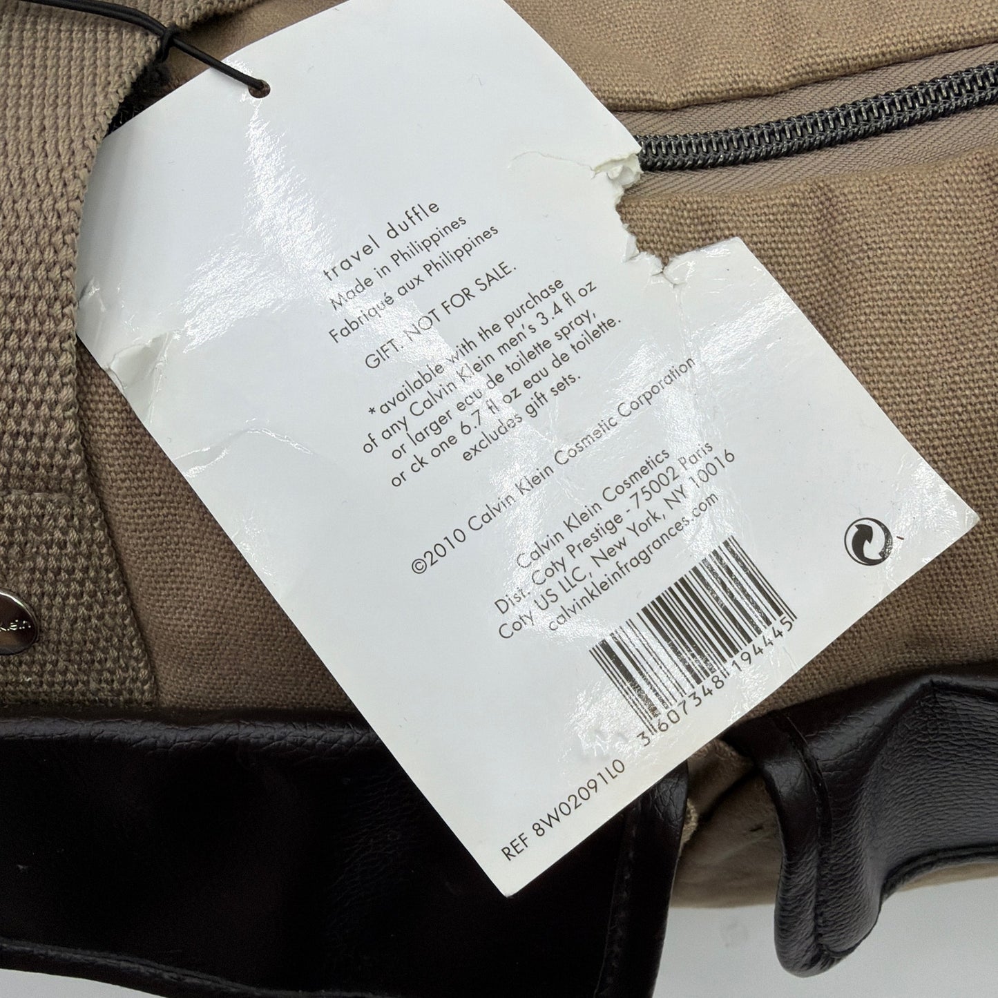 Calvin Klein Tan Canvas Travel Duffle Bag with Black Trim Gift With Purchase