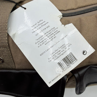 Calvin Klein Tan Canvas Travel Duffle Bag with Black Trim Gift With Purchase