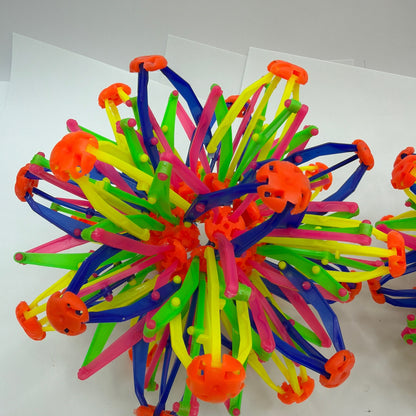 Lot of 2 Expanding Plastic Fidget Sphere Balls Multicolor