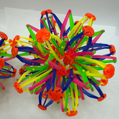 Lot of 2 Expanding Plastic Fidget Sphere Balls Multicolor
